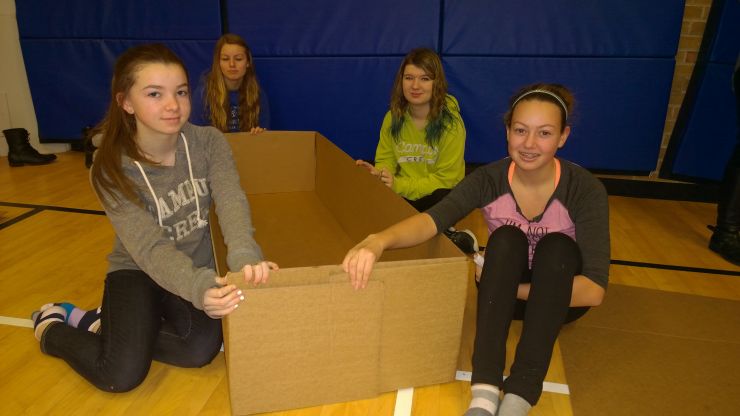 Students work with cardboard