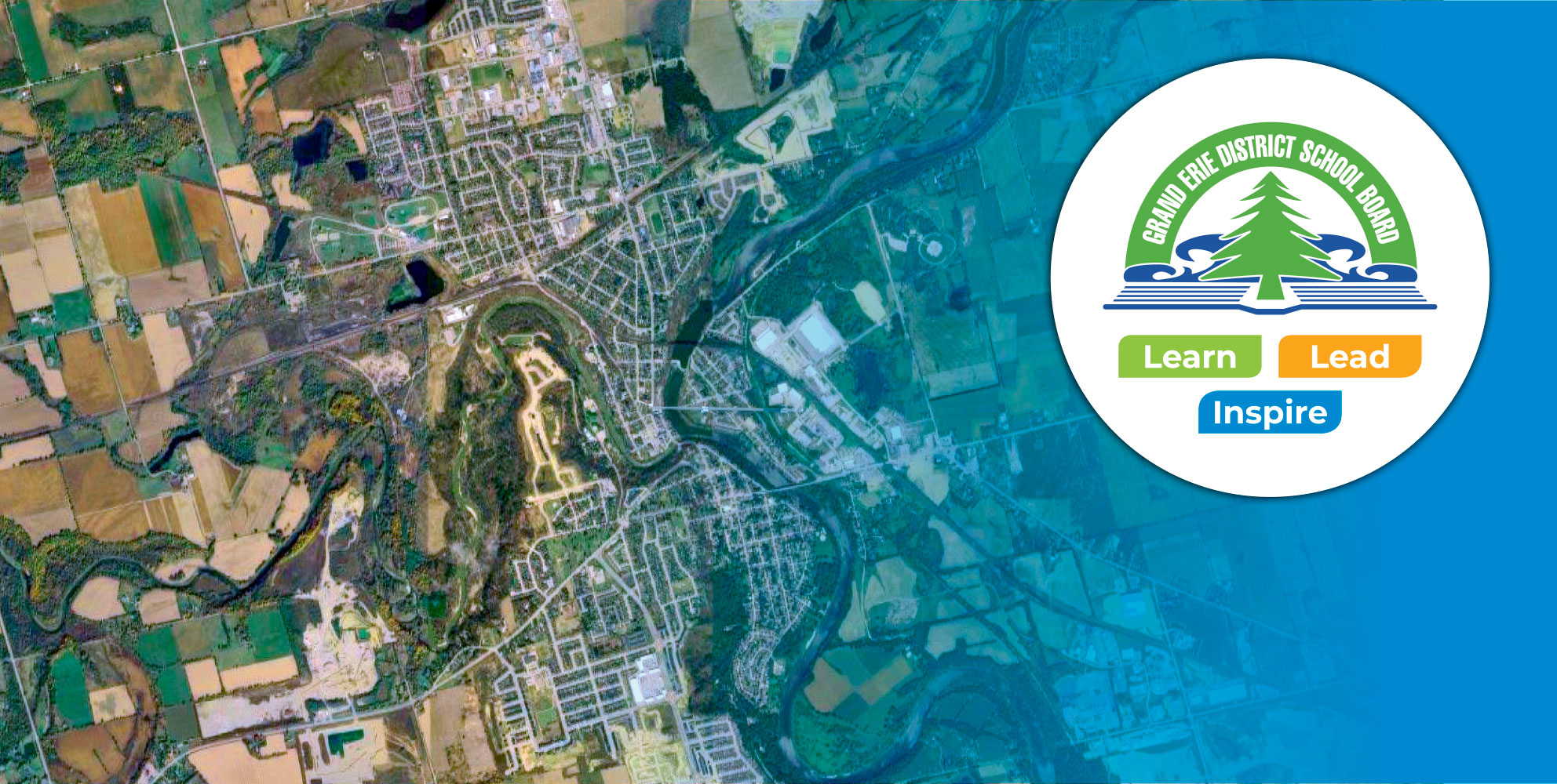 Aerial view of Paris with Grand Erie logo on top of fading blue background.