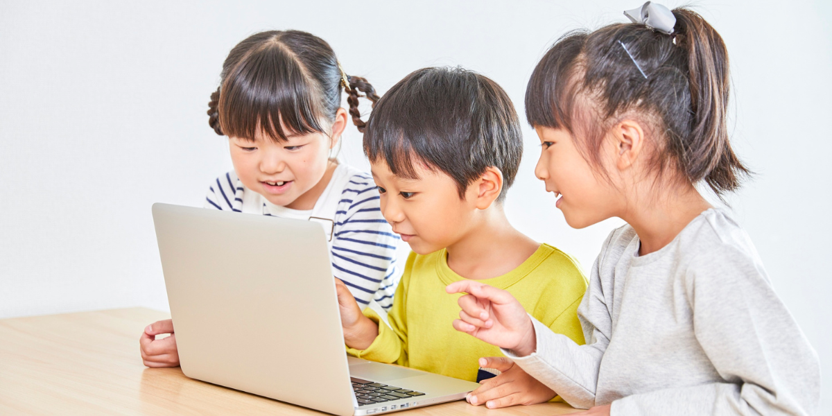 Three children on the computer