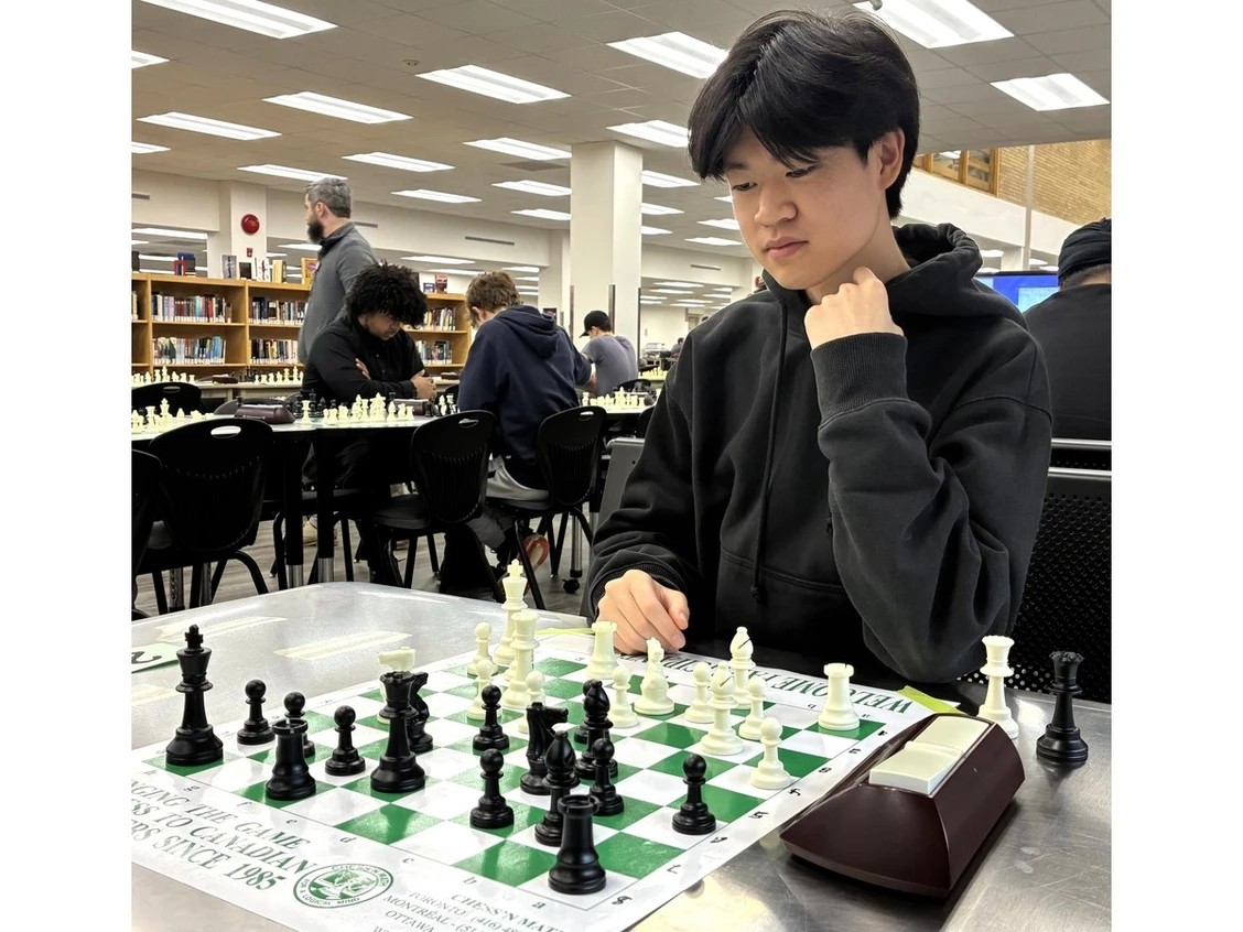 Andrew Song playing chess
