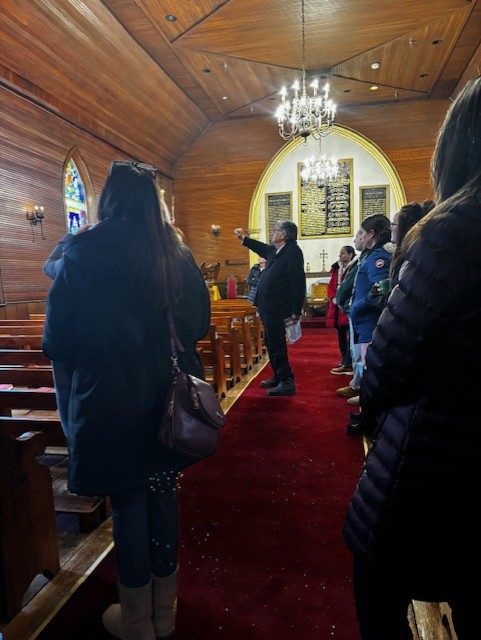 Staff take part in a guided tour of the H.M. Royal Chapel of the Mohawks
